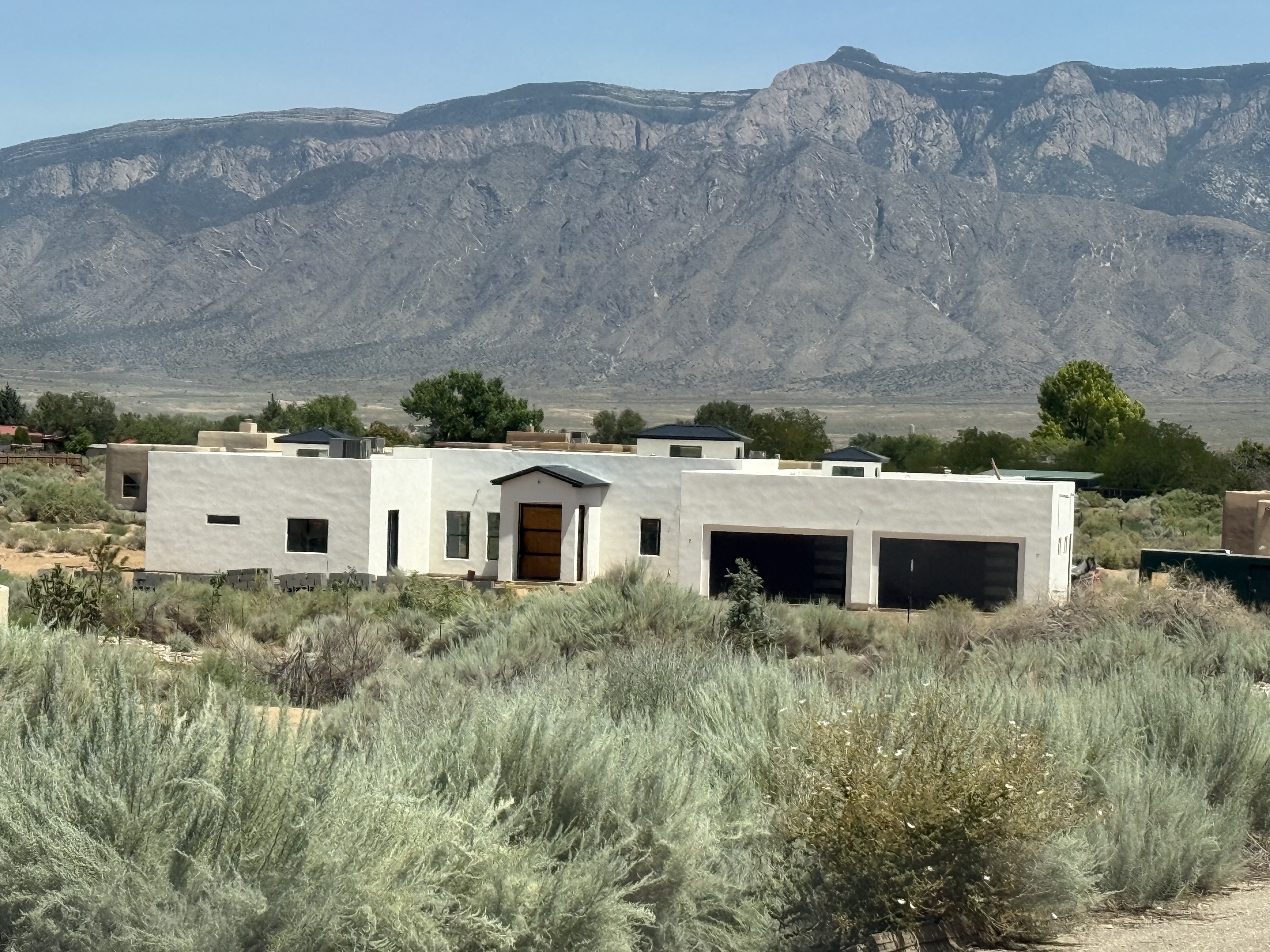 Modern New Mexico home with mountain backdrop