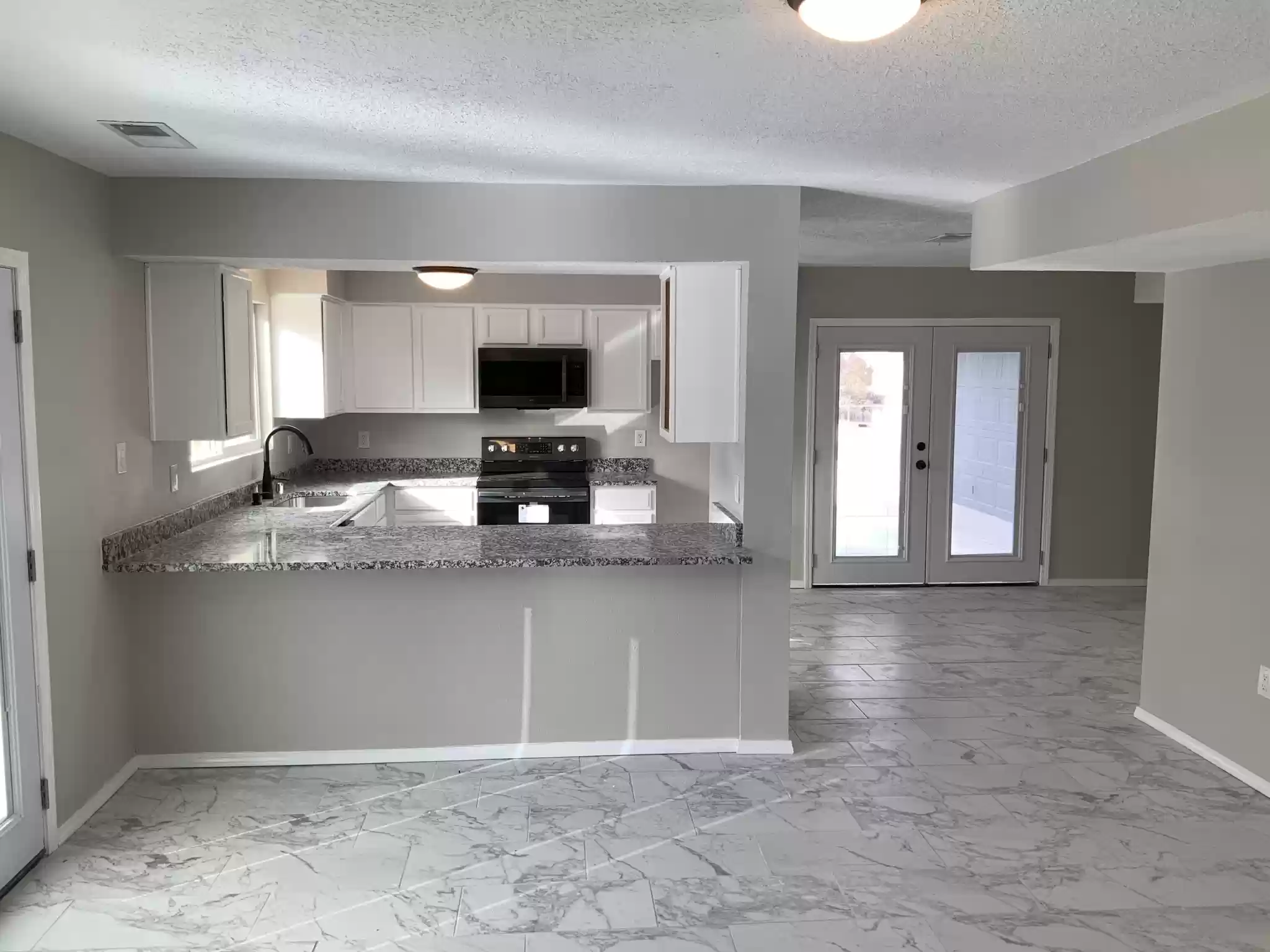 Kitchen remodel with gray finishes